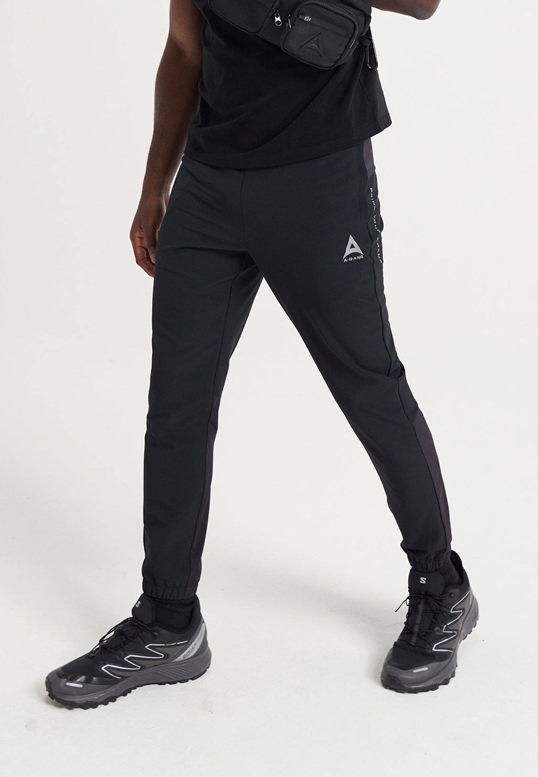 PANTALON D'ENTRAÎNEMENT À REVÊTEMENTS A-GAME POUR HOMMES - NOIR