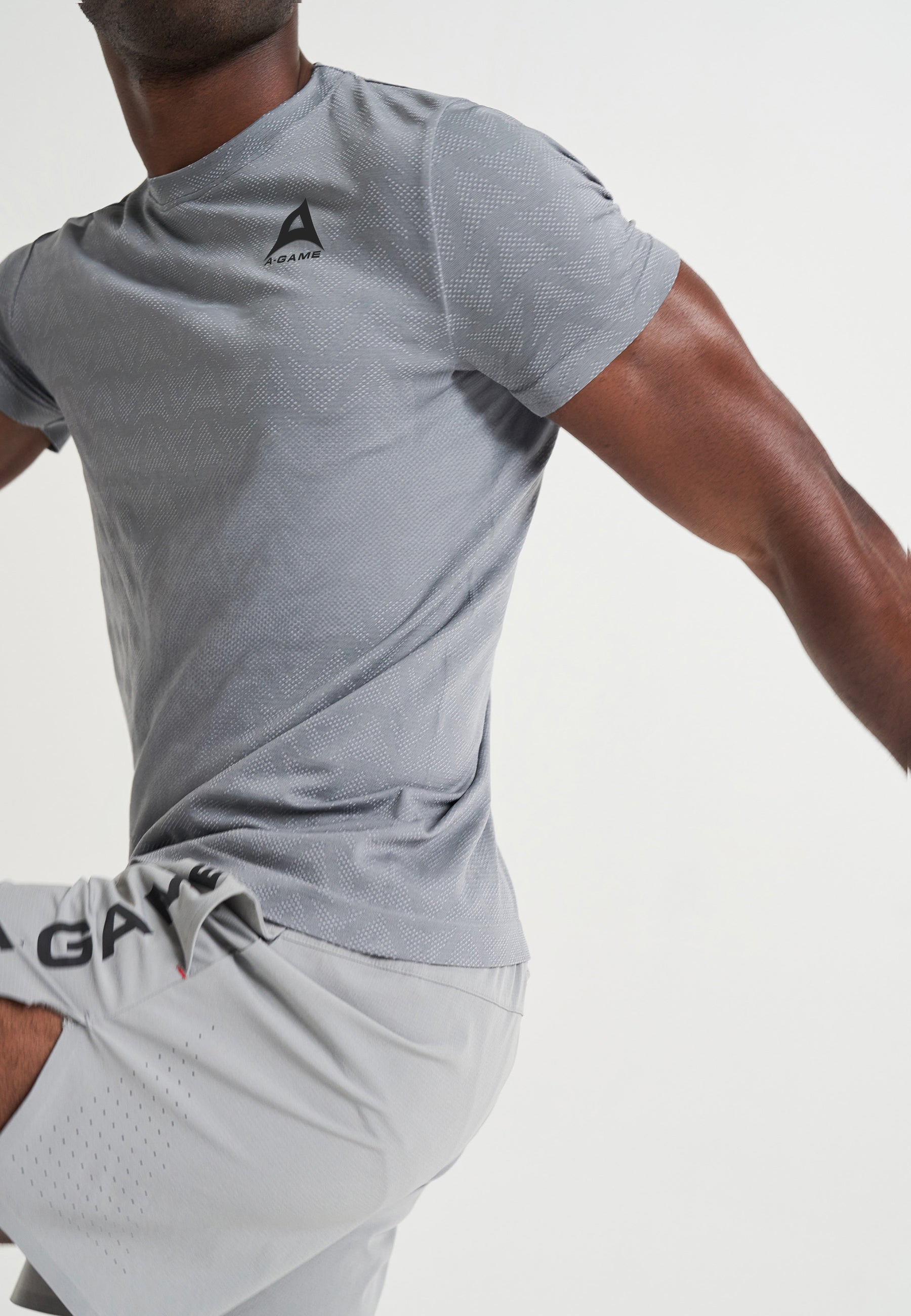 T-SHIRT AVEC LOGO D'ENTRAÎNEMENT SANS COUTURE A-GAME POUR HOMMES - GRIS ACIER
