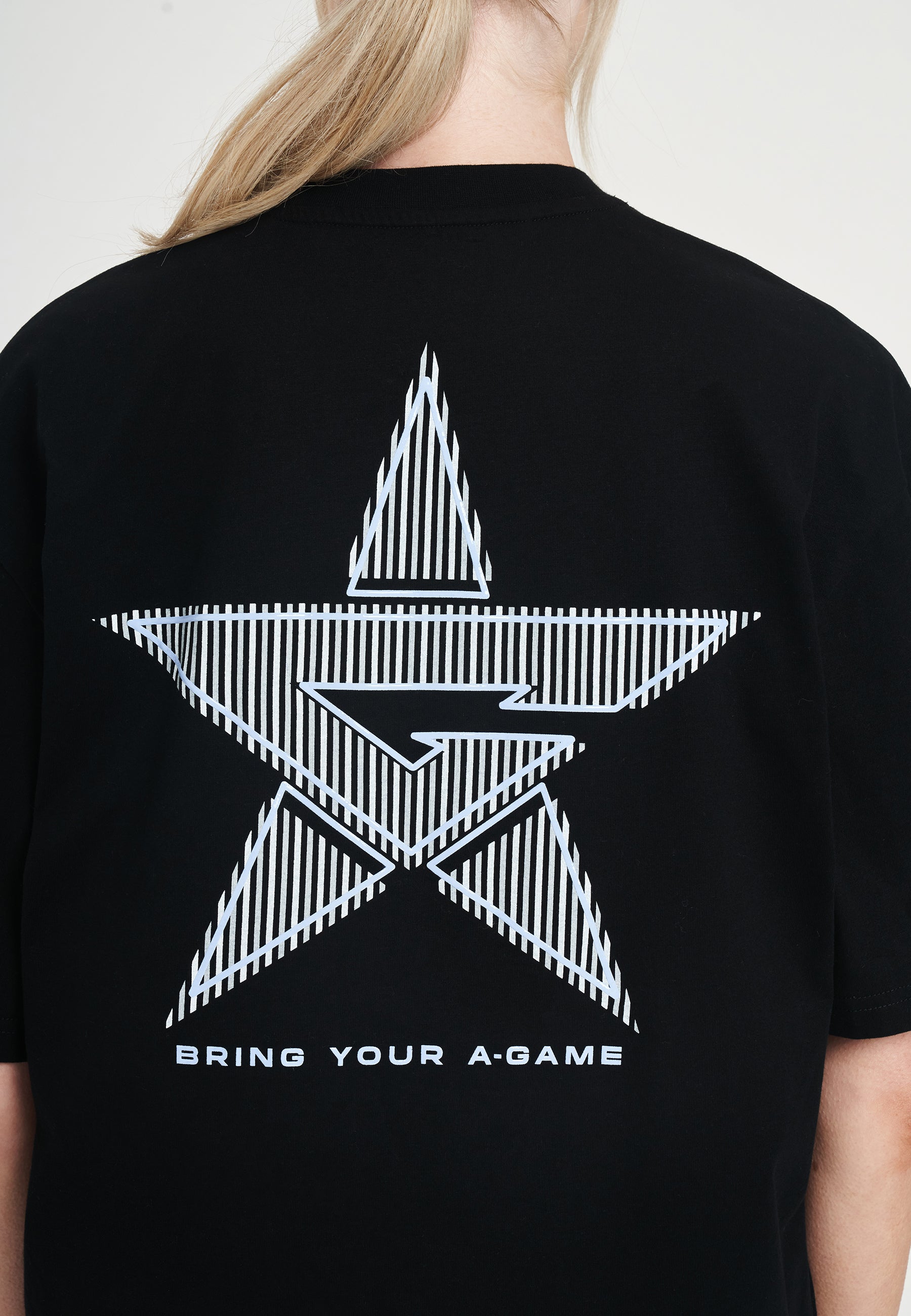 T-shirt rilassata con grafica A-Game Star da donna - Nera