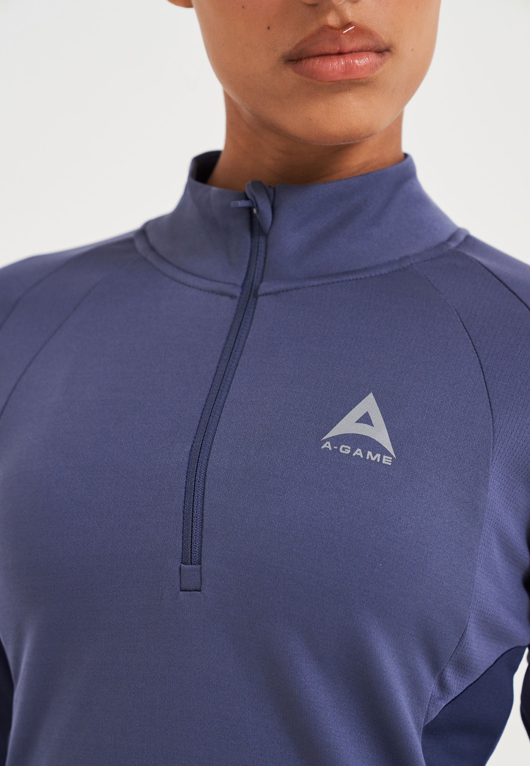 Top da allenamento aderente con zip A-Game Quarter da donna - Blu