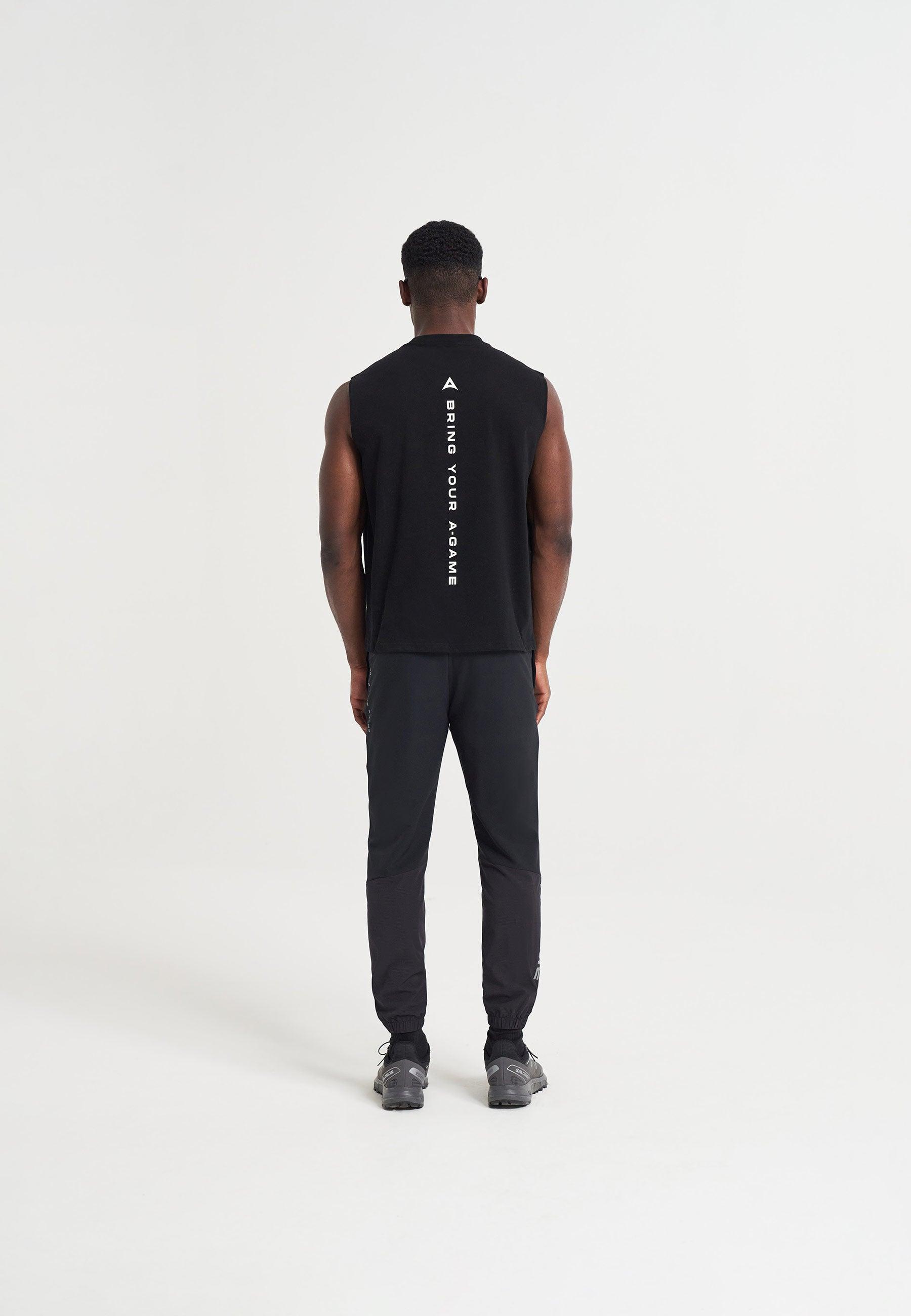 PANTALON D'ENTRAÎNEMENT À REVÊTEMENTS A-GAME POUR HOMMES - NOIR