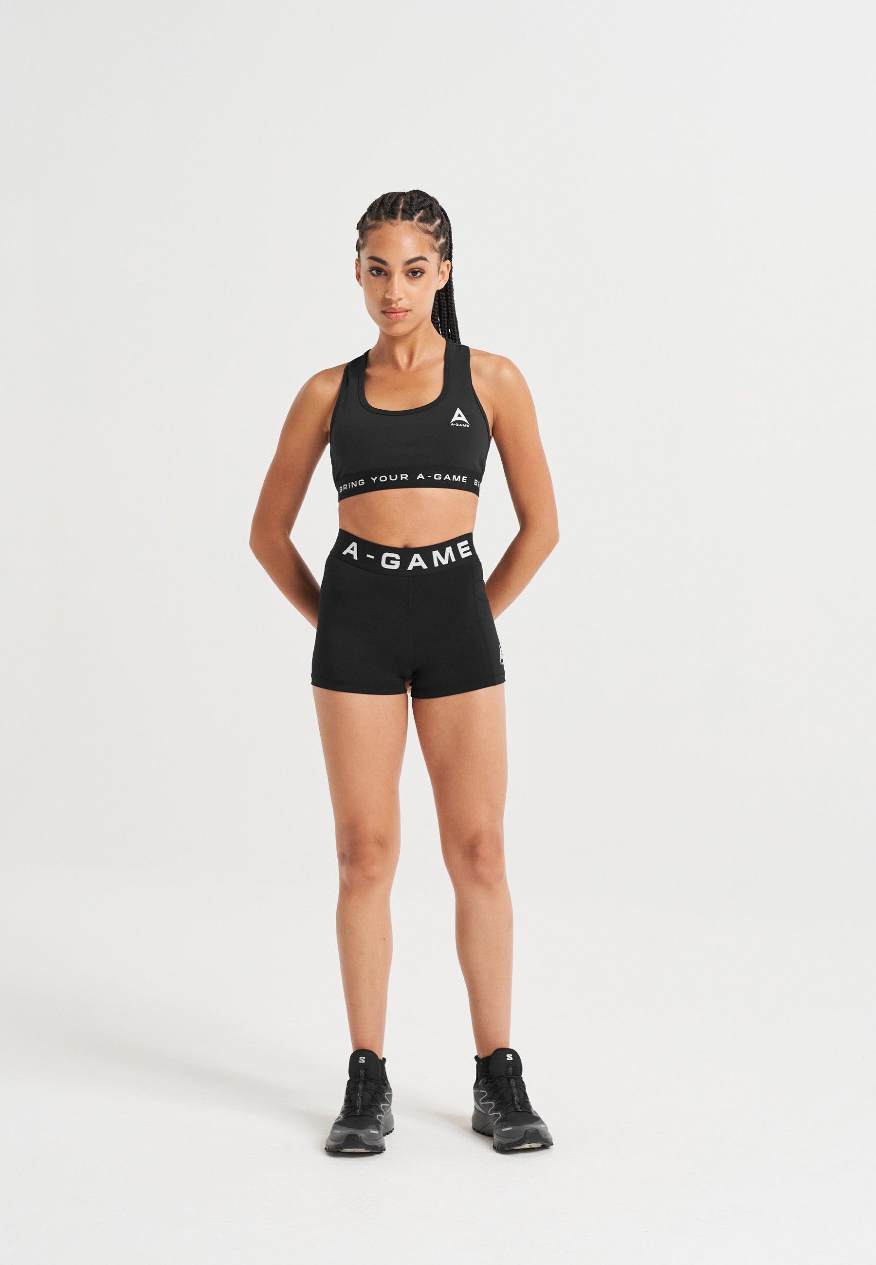 Pantaloncini corti da allenamento con logo A-Game da donna - neri